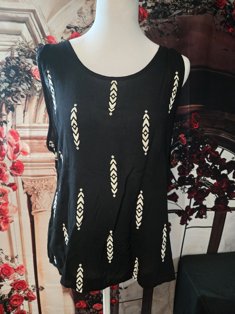 Black Sleeveless Blouse with Cream Geometric Accents